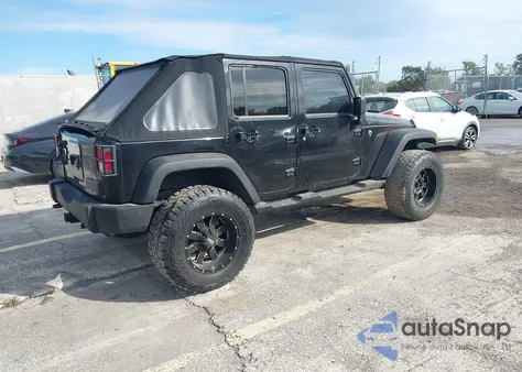 2010 Jeep Wrangler Unlimited Sport z USA, uszkodzony, nr VIN 1J4BB3H17AL200272